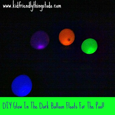 glow in the dark balloons in a swimming pool at night