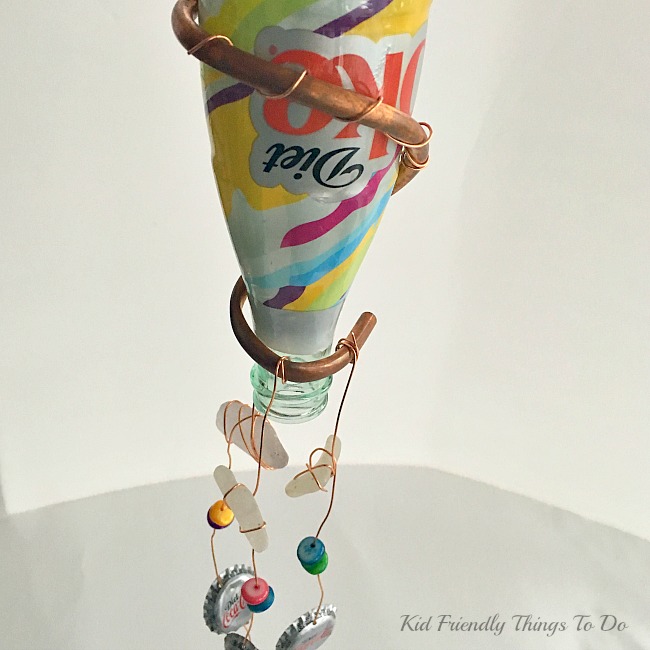 Turning a Coca-Cola Bottle into a Wind Chime. The New Colorful Diet Coke Bottle Wind Chime Craft - KidFriendlyThingsToDo.com