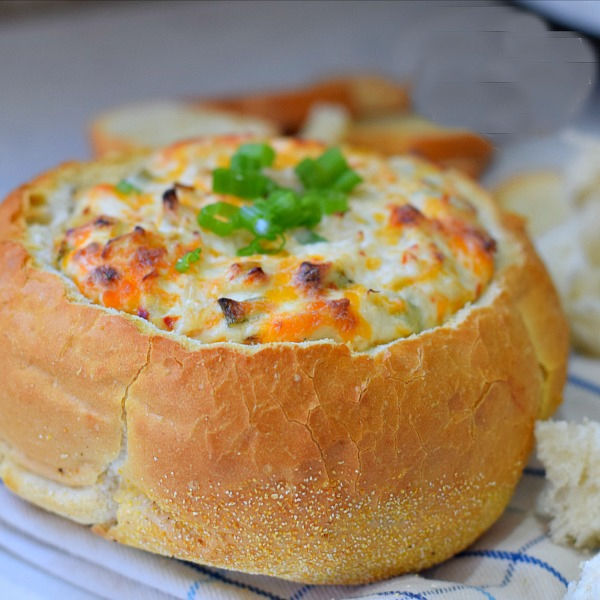 hot crab dip in a bread bowl