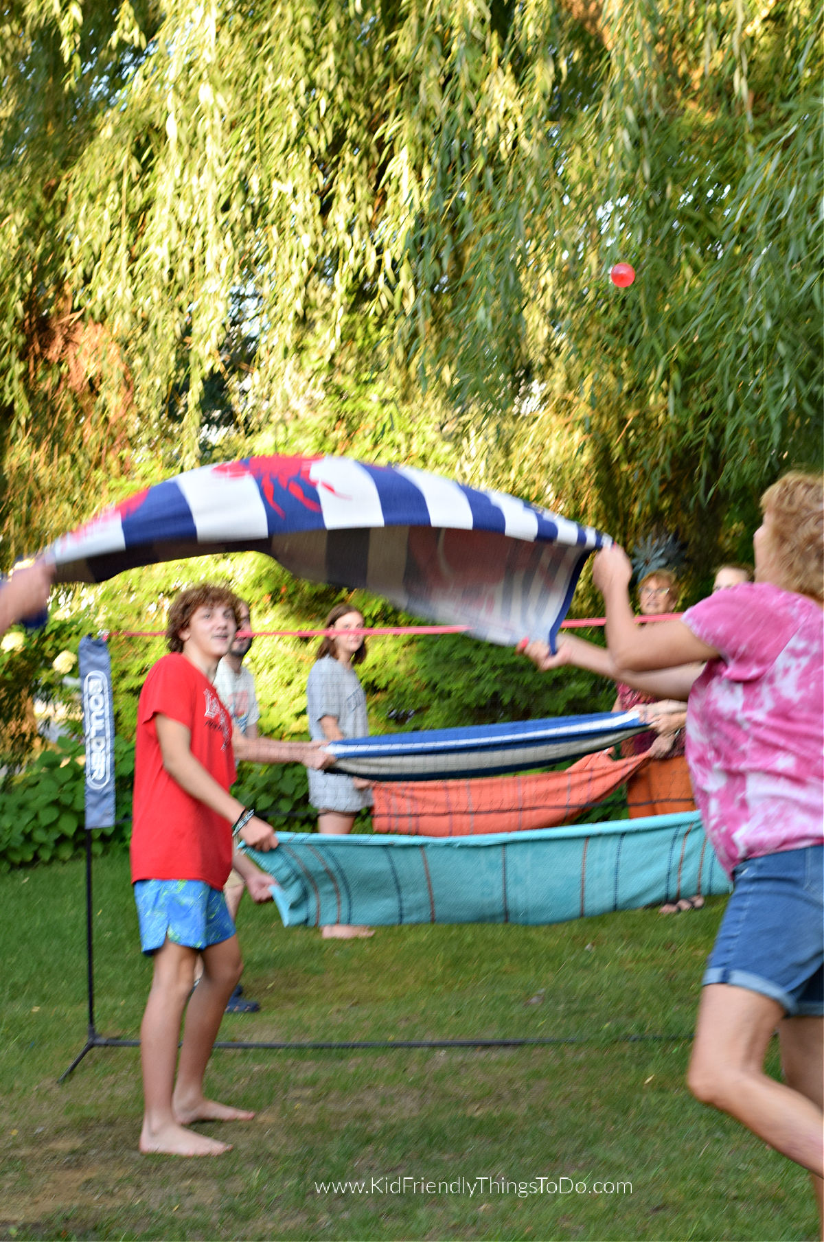 playing water balloon volleyball 