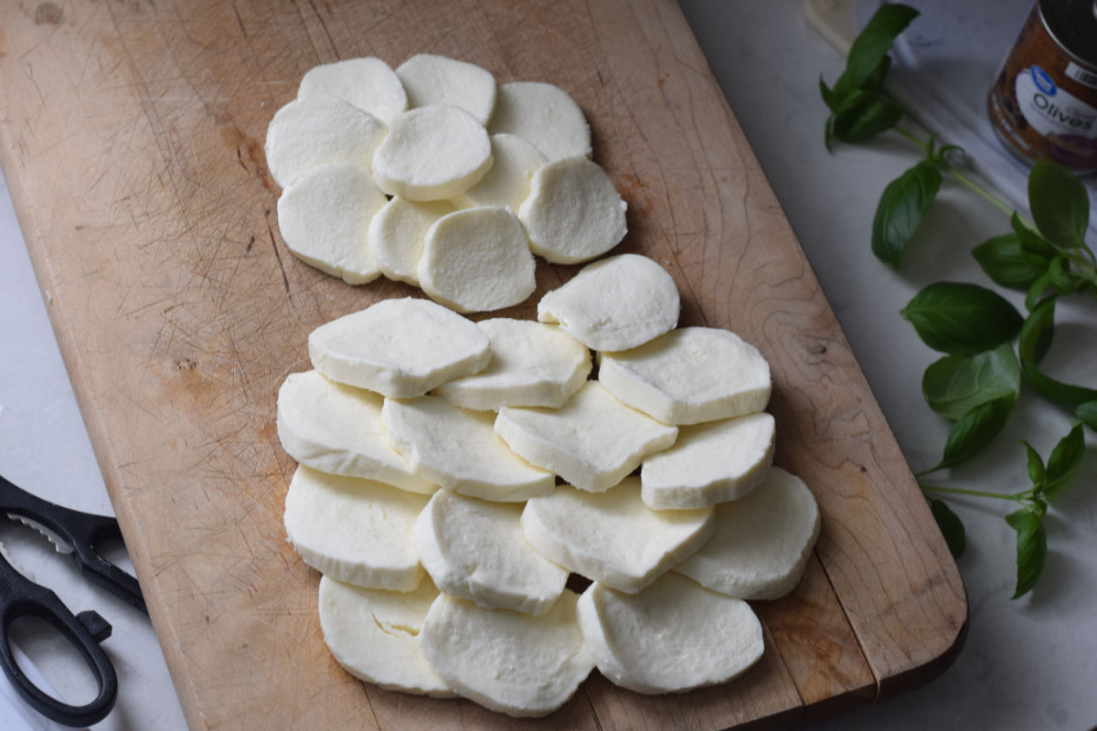 Making a snowman Caprese salad 