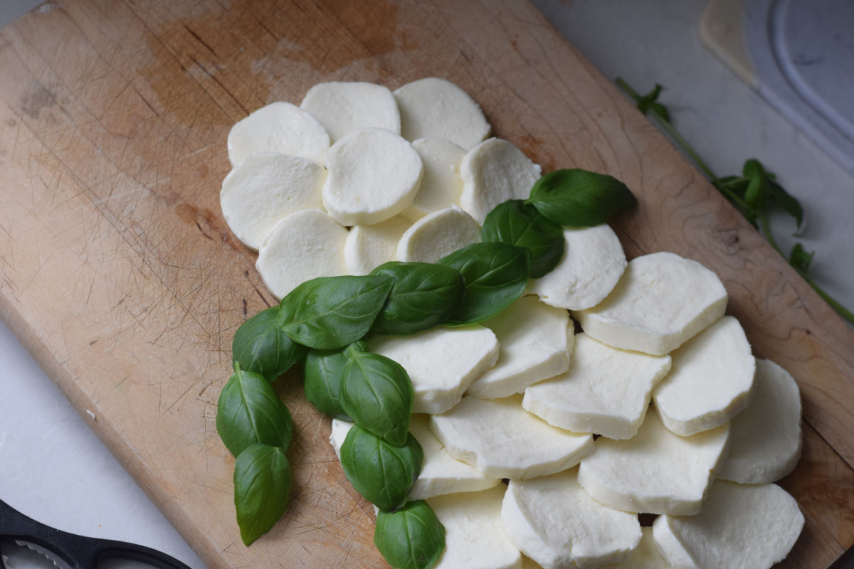 Making a snowman Caprese salad 