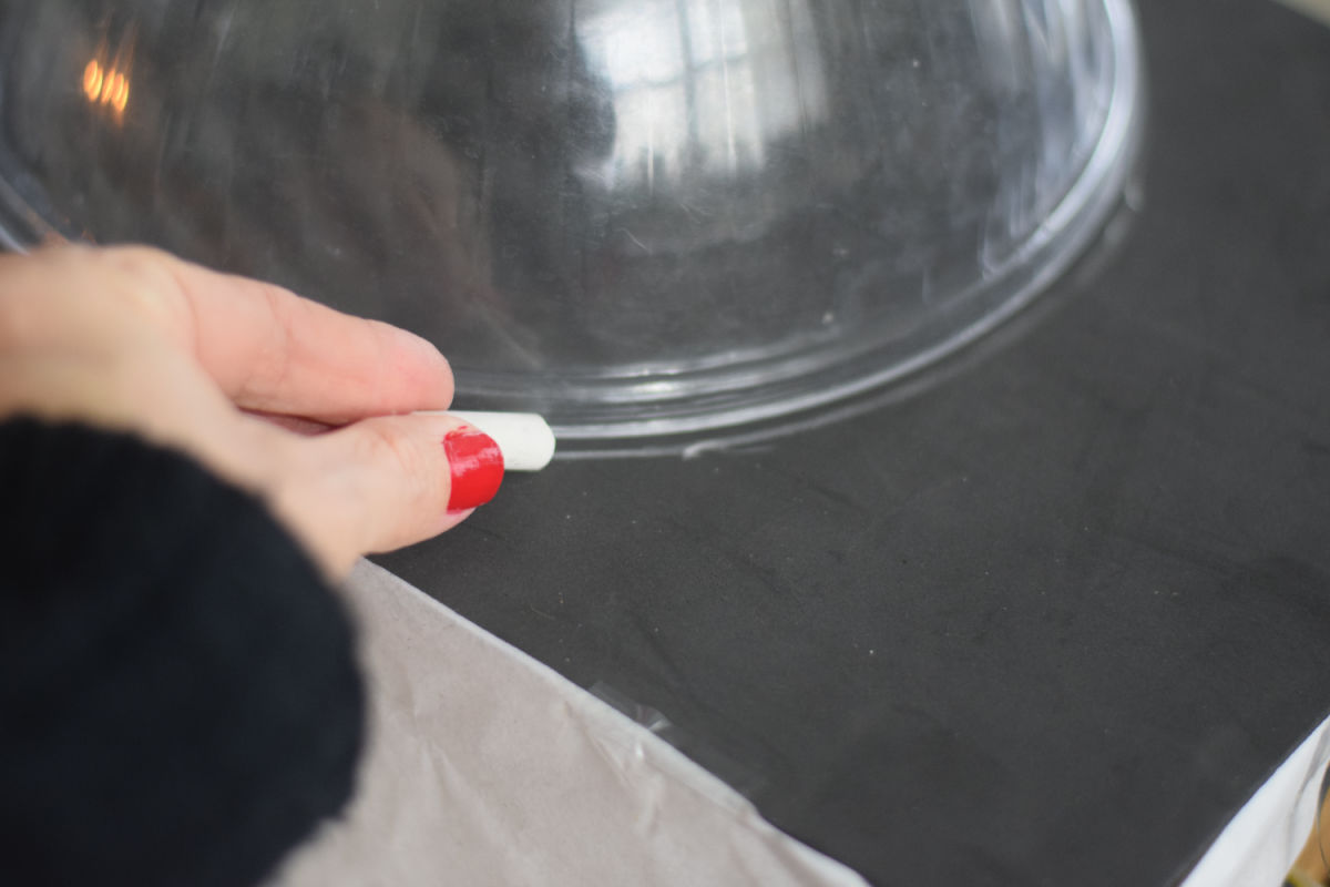 tracing a bowl onto foam paper 